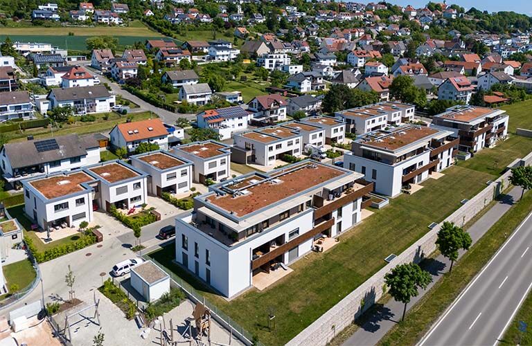 Bauprojekt "Südlich der Heusteige": Rohbau für 3 Mehrfamilien- & 12 Kettenhäuser